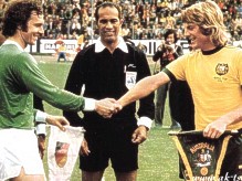 Beckenbauer and Wilson changing pennants